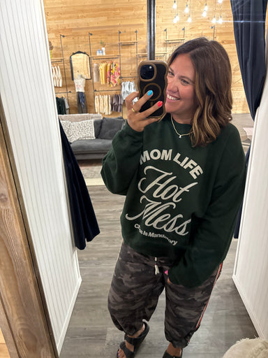 Green varsity Mom sweatshirt from Quotes + Cotton clothing boutique in Burlington, WI.